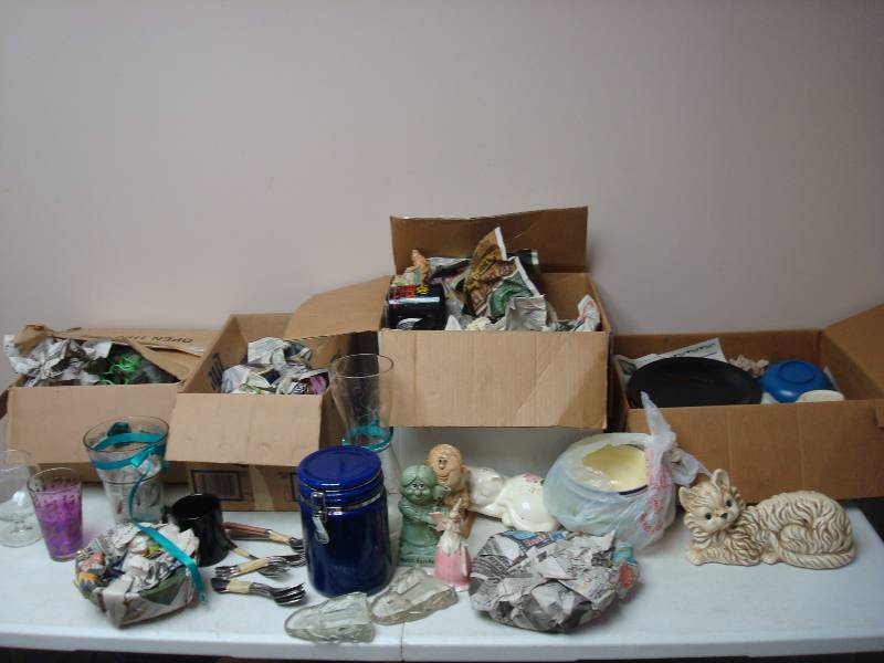 Boxes Filled Glasses And Dishes