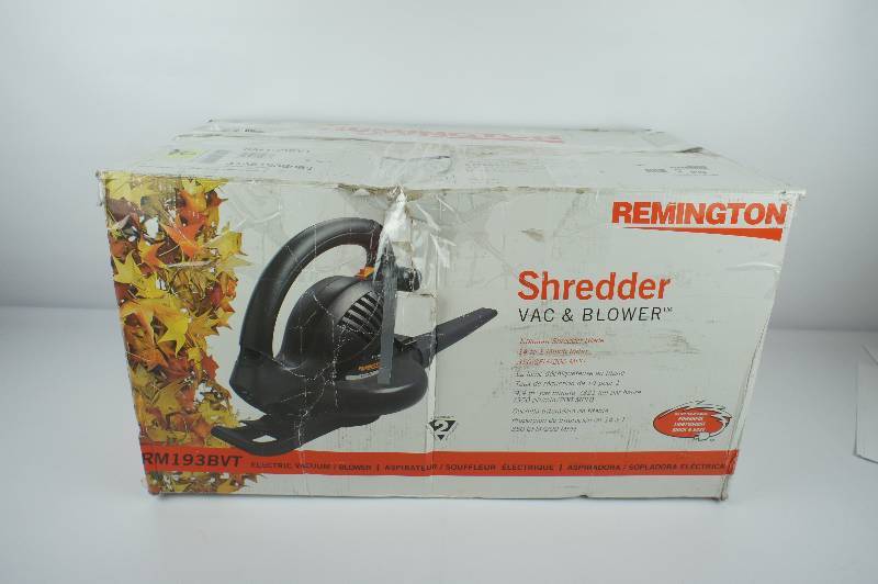 lot 13 image: Remington Shredder 12 Amp Electric BlowerVacuumMulcher Combo