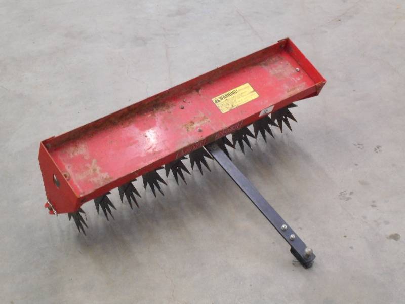 lot 16 image: Lawn Tender 36 Pin-Hitch Lawn Aera...