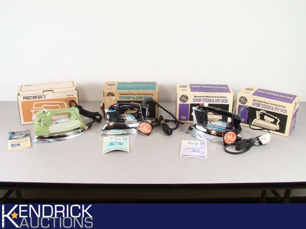 lot 31 image: Lot of 4 Vintage New Old Stock Steam & Dry Irons
