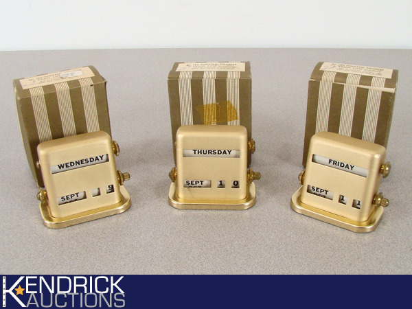 lot 41 image: Lot of 3 New Old Stock Vintage Brass Perpetual Calendars