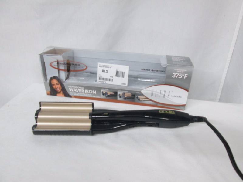 lot 63 image: Andis Ultra Professional Wave Iron