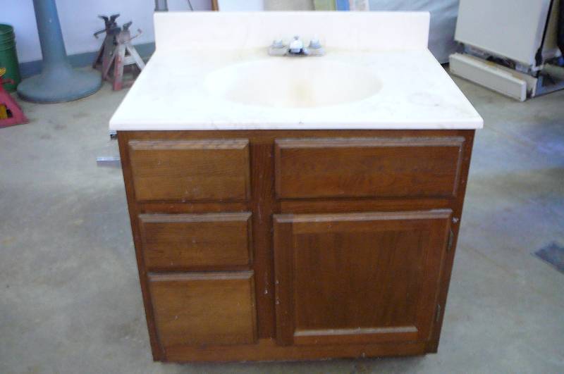 lot 5 image: Wooden Vanity and Sink 31 wide X 22deep X 31 12 High