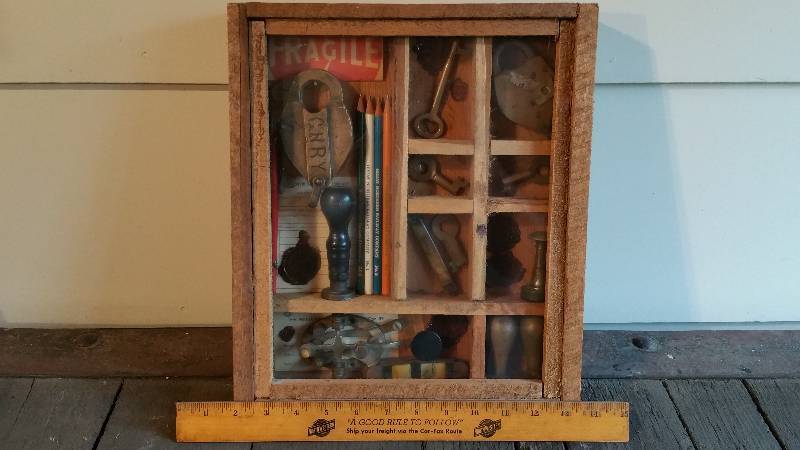 lot 7 image: Railroad Memoribilia Shadowbox - Locks, Wax Stamps, Etc.