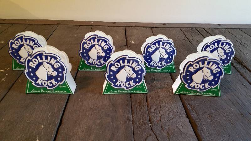lot 203 image: Lot of (7) Rolling Rock Table Top Napkin Holders