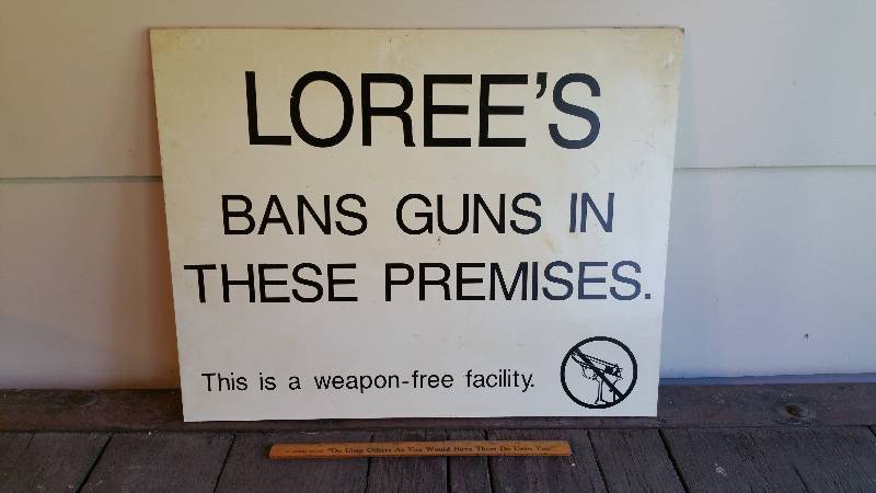 lot 311 image: Lorees Bans Guns Sign from Family Bar