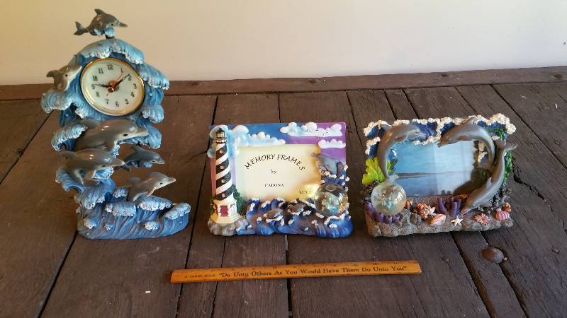 lot 319 image: Dolphins, Lighthouse Plaster Photo Frames & Clock