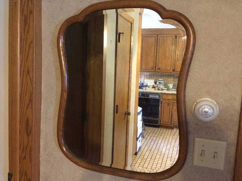 lot 103 image: Vintage Beveled Glass Mirror In Oak Frame