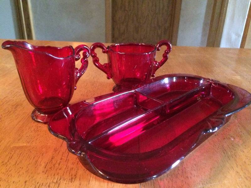 lot 234 image: Red Ruby Depression Glass, Cream & Sugar & Relish Dish