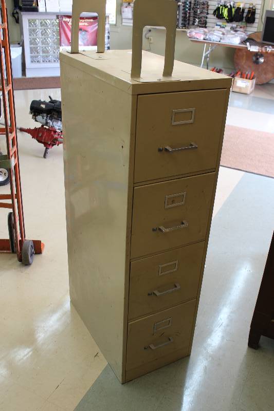 lot 29 image: Metal Filing Cabinet w4 Drawers 25 x 16 x 52.