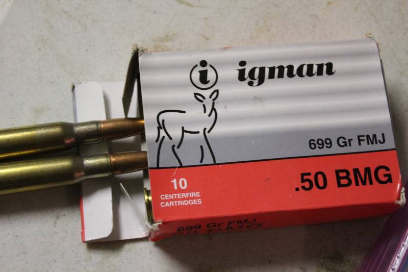 lot 52 image: Box Lot Of Igman 50 BMG 699 Gr. FMJ Ammo app. 10 rounds.
