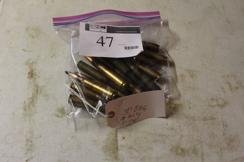 lot 47 image: Bag Lot of 50BMG Ammo app. 15 rounds Black Tip (10) FMJ (5).