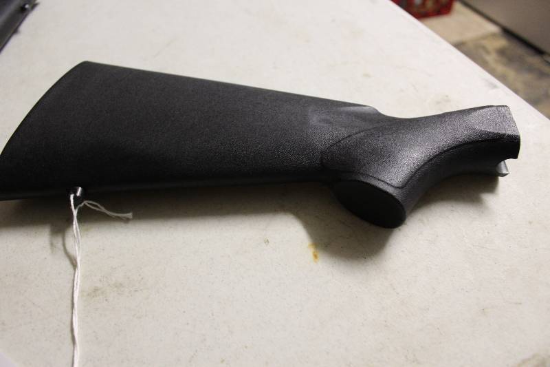 lot 82 image: Rifle Butt Possibly Mossberg.