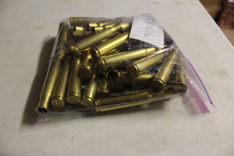 lot 98 image: Bag Lot of 50 BMG Brass Ammo app. 50 ct.