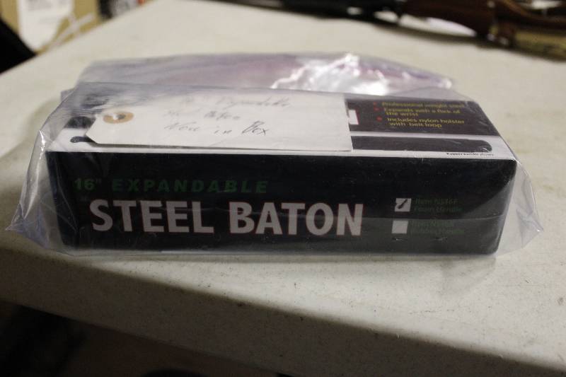 lot 109 image: 16 Expandable Steel Baton New In Box.