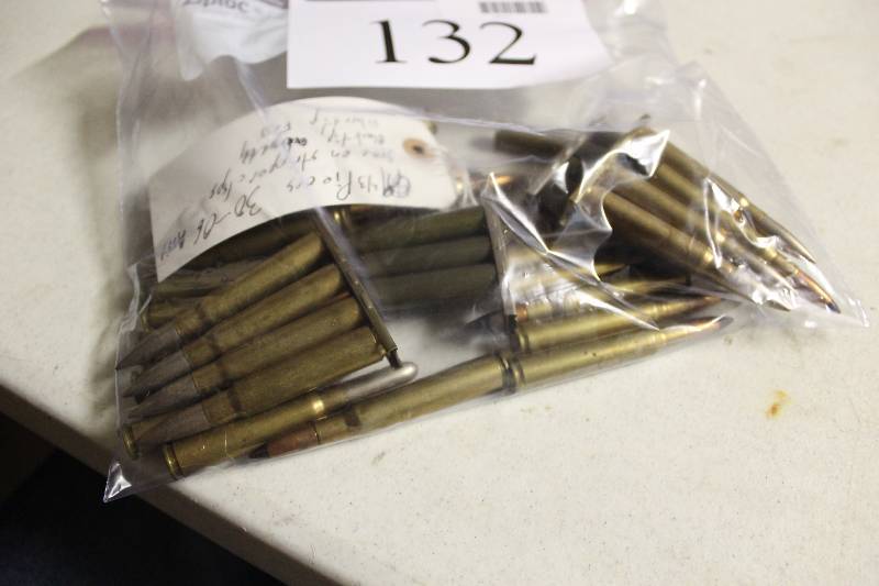 lot 132 image: Bag Lot of 30-06 Ammo app. 43 rounds Some On Stripper Clips Black Tip, Silver Tip FMJ.