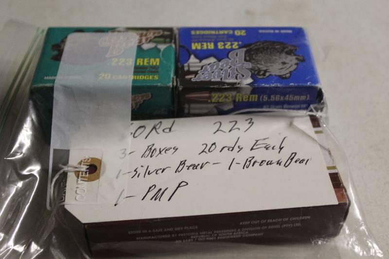 lot 133 image: Box Lot of (3) 223 Remington app. 60 total rounds Silver Bear, Brown Bear, PMP Brands.