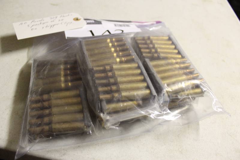 lot 143 image: Bag of (100 ct.) Miscellaneous 308 Blank Rounds 5 Packages of 20 On Stripper Clips.