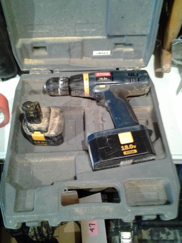 lot 102 image: Ryobi 18V Drill With Battery & 1-12V Battery