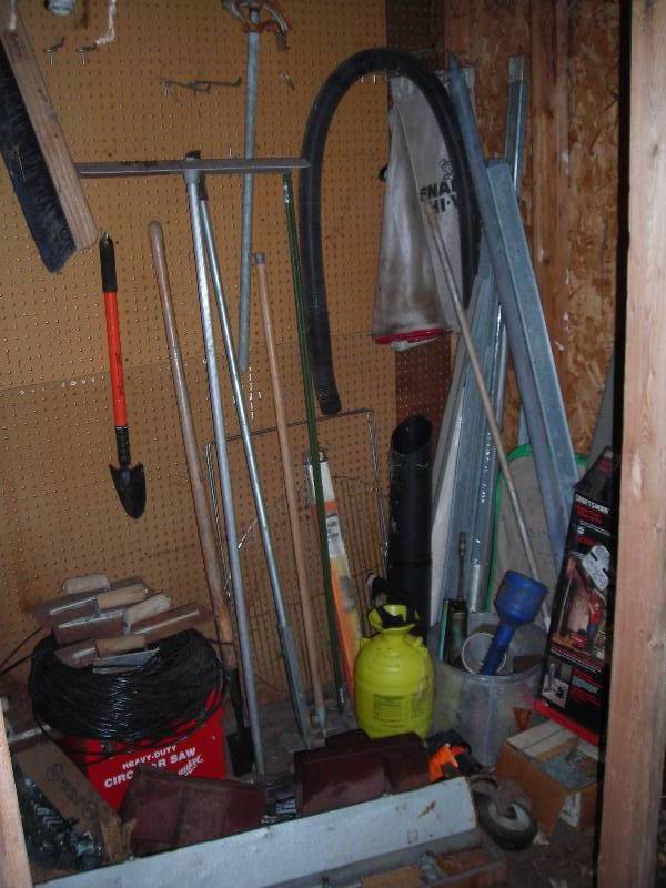 lot 137 image: Contents In Storage Room Pipe Bender, Trowels, Nails, Scrapers, Coax Cable