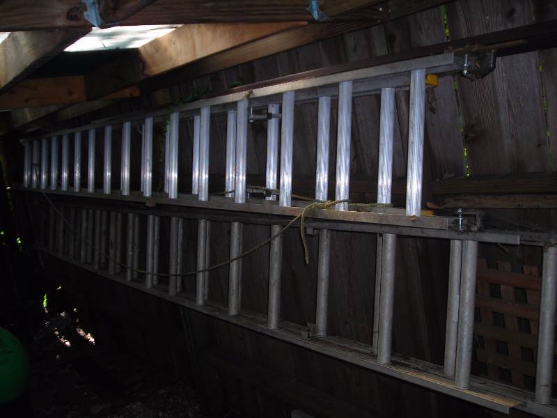 lot 139 image: Louisville 32 Ft Aluminum Extension Ladder (Top One In Photo)