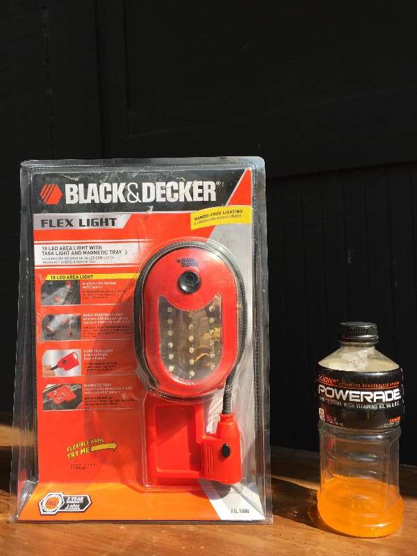 lot 26 image: New in the Box Black and Decker Flex Light