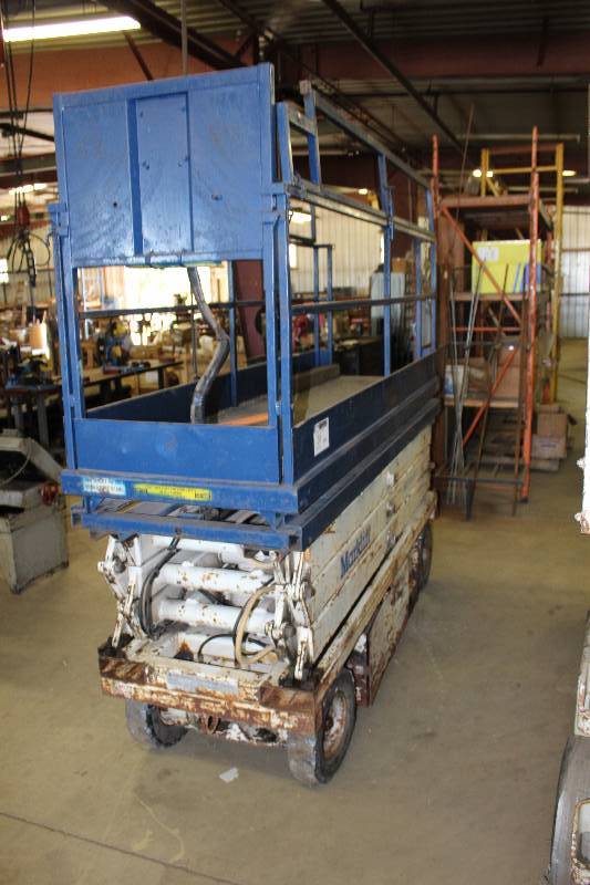 lot 20 image: Mark Lift Scissors Lift wGated Platform 1408.2 Hours Indicated Model MX20 Needs Battery Tested & Operational.