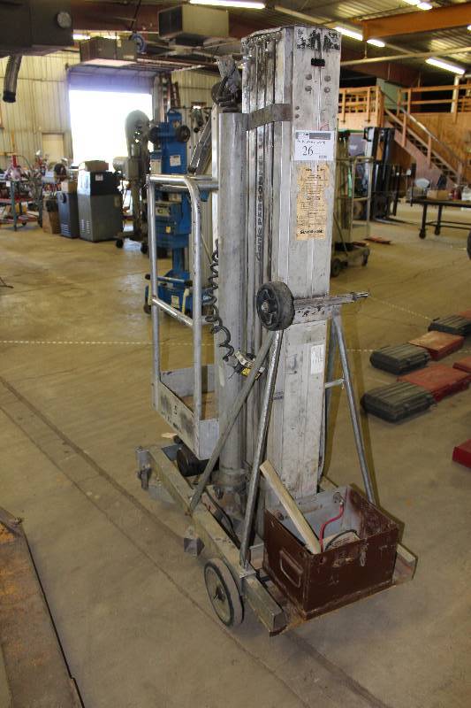 lot 26 image: Genie Personnel Lift Model PLC-24 300lbs Capacity Sold As Is - Needs Work.
