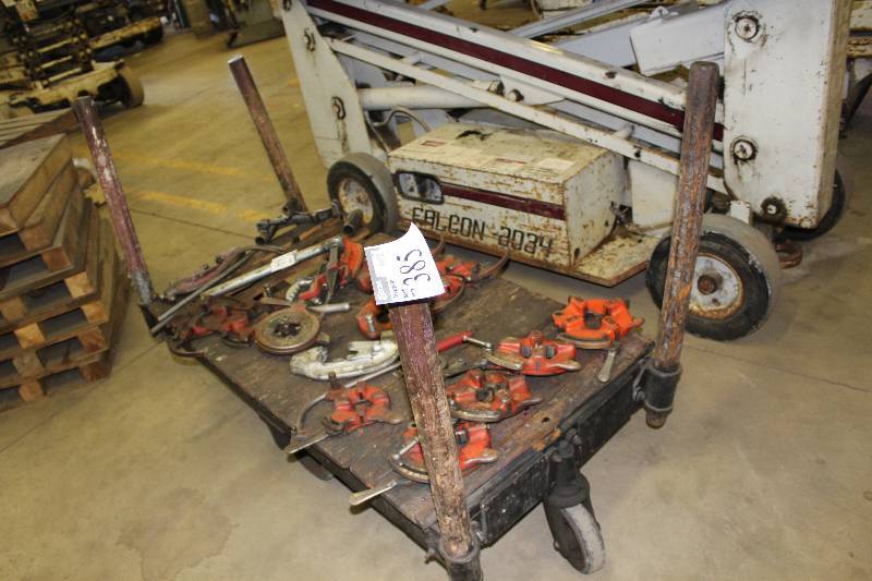 lot 385 image: Metal Cart wCenter Wheels & Corner Poles Does Not Include Contents 34 x 68 x 34.