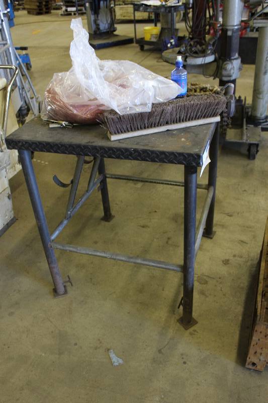 lot 67 image: Metal Table Heavy Duty Includes Contents Rope, Measuring Tape, Push Broom End, And More 32 x 35 x 38.