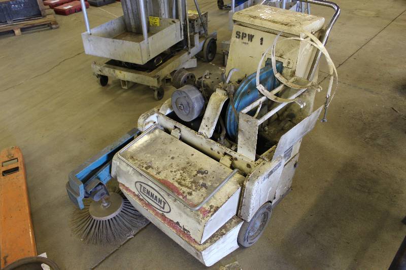 lot 68 image: Tenant 42 Heav-Duty Floor Sweeper, User Operated Cleaning Machine Runs Weak Battery.
