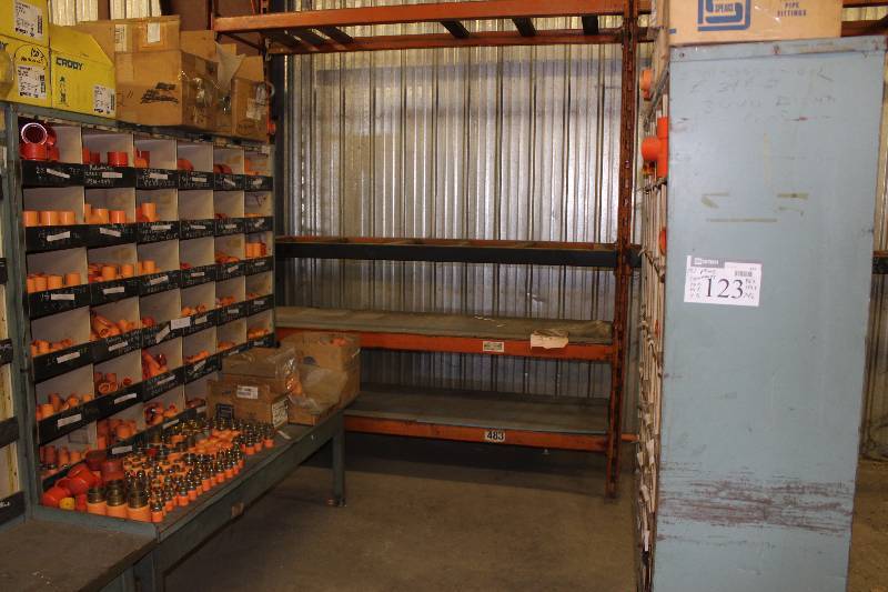 lot 123 image: Lot of (2) Storage Shelf wMultiple Compartments Includes Contents of Compartments & Table Plastic Pipe Tees, Miscellaneous Sizes Plastic Connectors, Miscellaneous Sizes