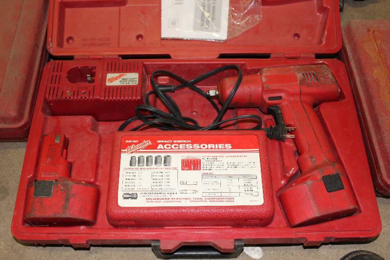 lot 80 image: Milwaukee Heavy-Duty Impact Wrench wBattery Charger, Battery, Accessories & Hard Case.