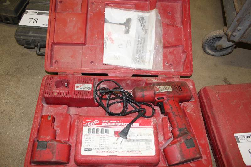 lot 81 image: Milwaukee Heavy-Duty Impact Wrench wBattery Charger, Battery, Accessories & Hard Case.