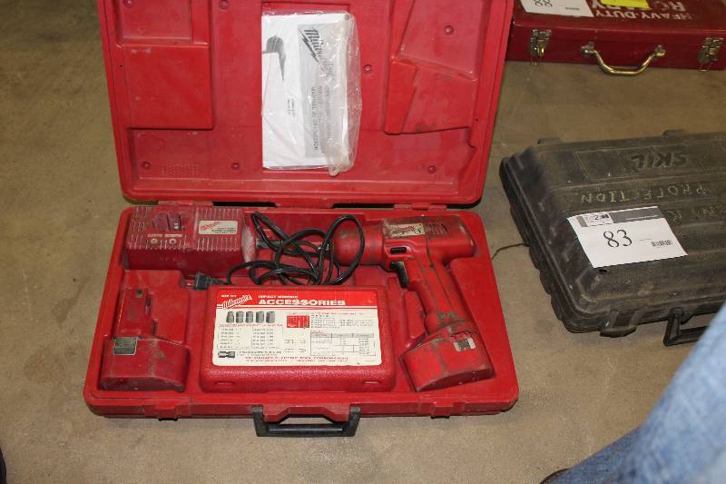 lot 82 image: Milwaukee Heavy-Duty Impact Wrench wBattery Charger, Battery, Accessories & Hard Case.
