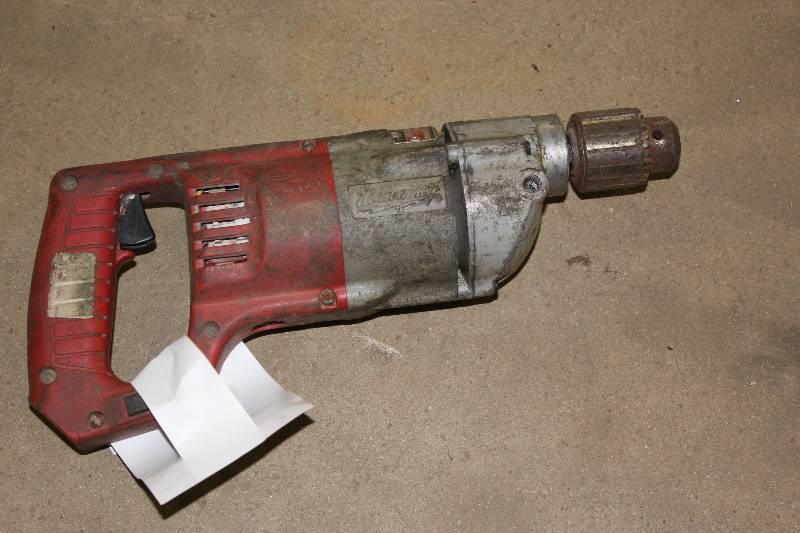 lot 94 image: Milwaukee Heavy Duty 12 Drill Does Not Have Cord.