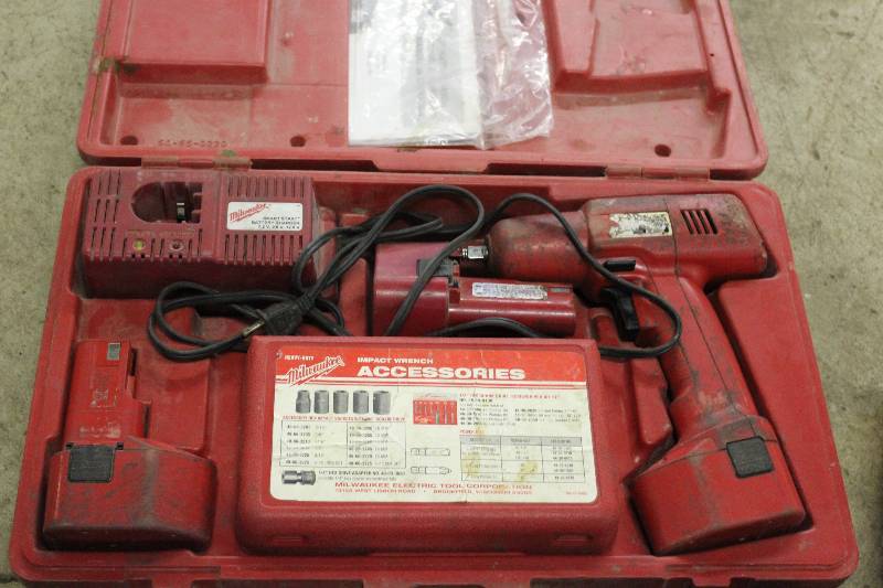 lot 71 image: Milwaukee Heavy-Duty Impact Wrench wBattery Charger, Battery, Accessories & Hard Case.