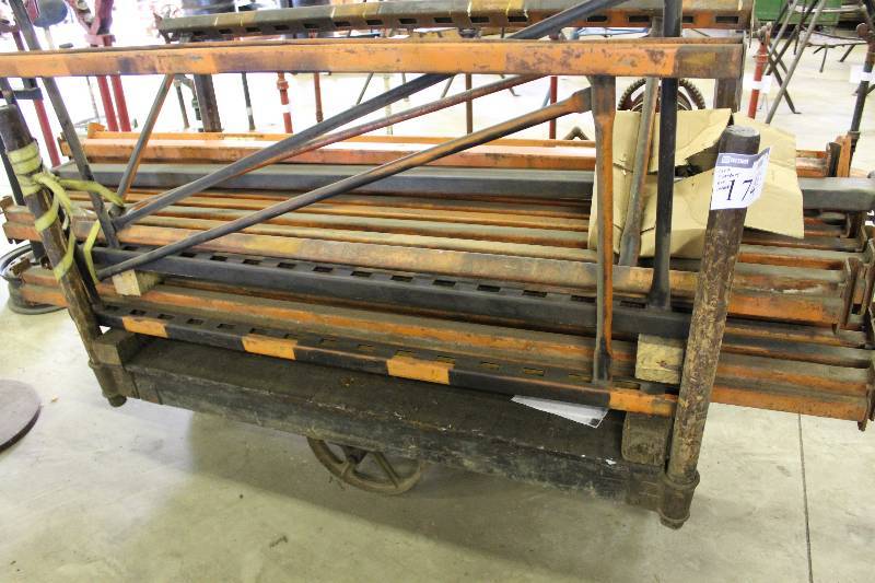 lot 174 image: Cart wCenter Wheels & Corner Bars Does Not Include Contents 30 x 65 x 15.