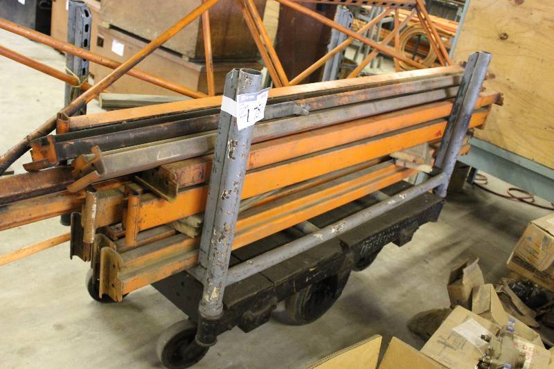 lot 175 image: Cart wCenter Wheels & Corner Bars Does Not Include Contents 35 x 65 x 19.