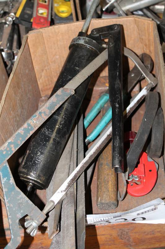 lot 320 image: Box Lot of Tools Including Grease Pump Hack Saw Hammer And More.