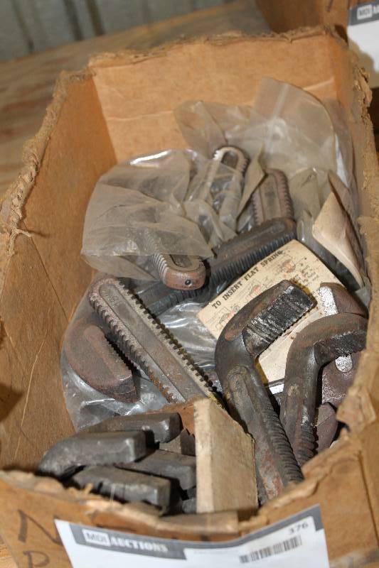 lot 376 image: Box Lot of Pipe Wrench Parts.