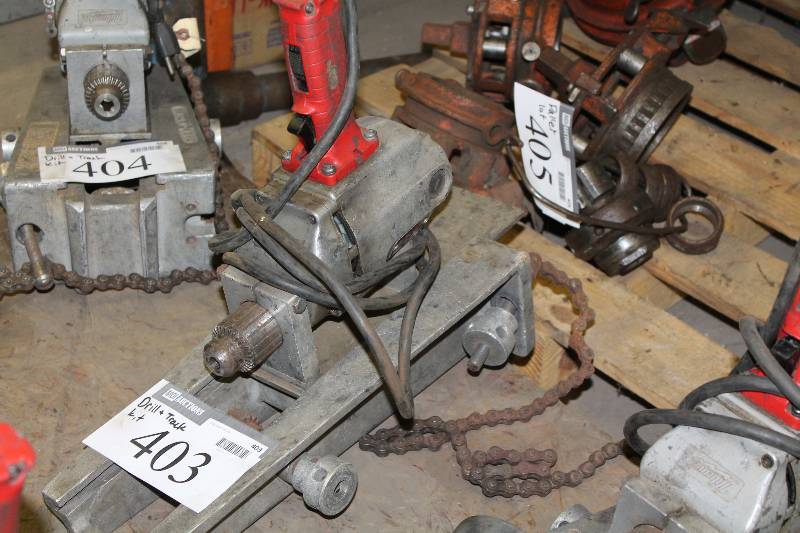 lot 403 image: The Hole Thing 12 Drill & Track Kit.