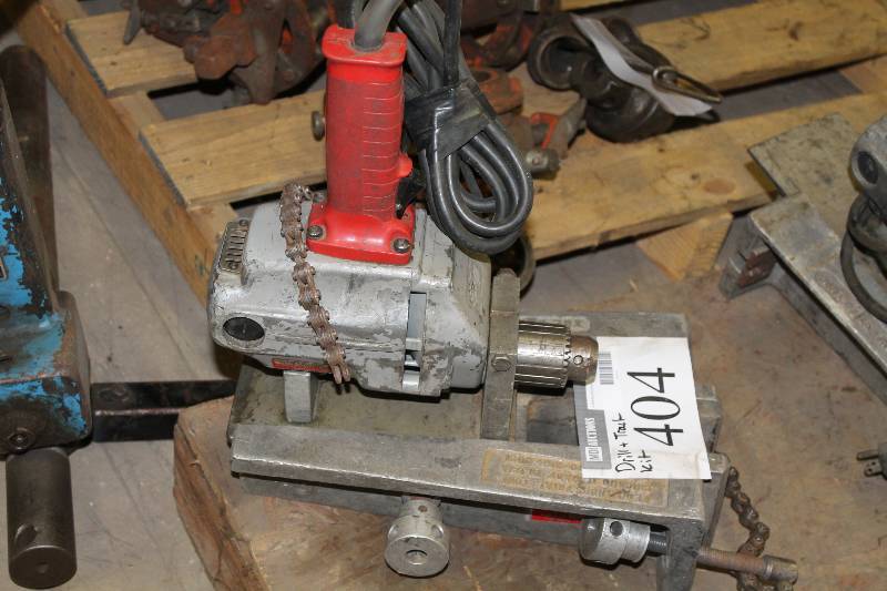 lot 404 image: The Hole Thing 12 Drill & Track Kit.