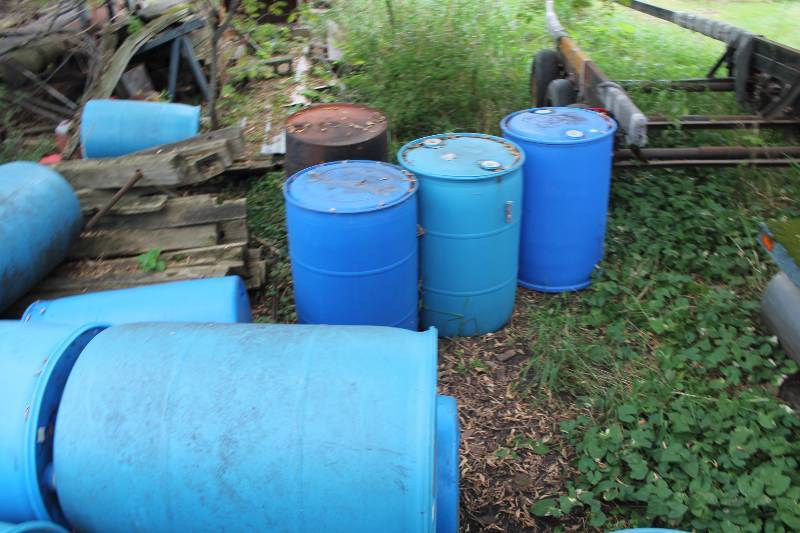 lot 746 image: Lot of (10) Blue Plastic Barrells wLids First Come First Serve.