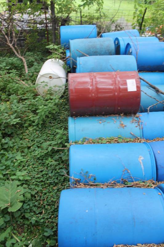 lot 751 image: Lot of (10) Blue Plastic Barrells wLids First Come First Serve.