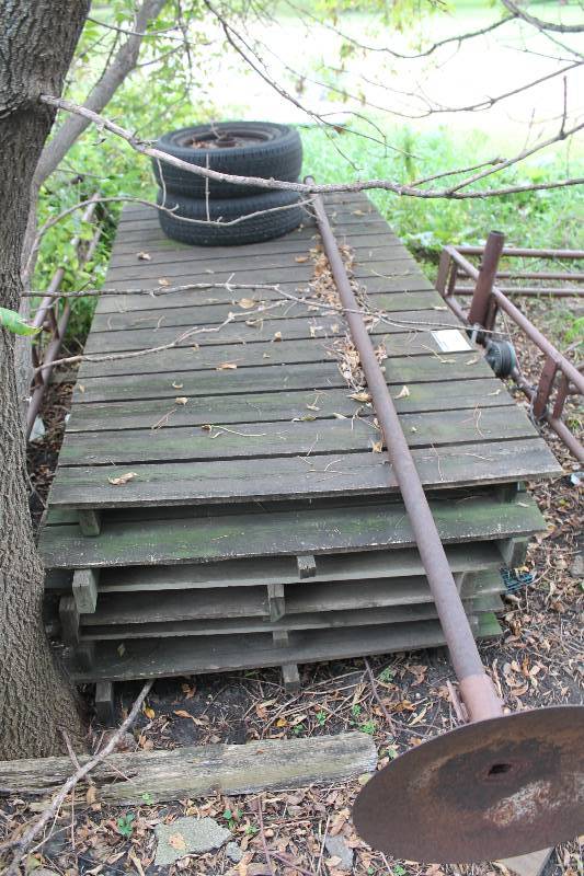 lot 755 image: Metal Dock Chainsaw Required To Get One Section Out.