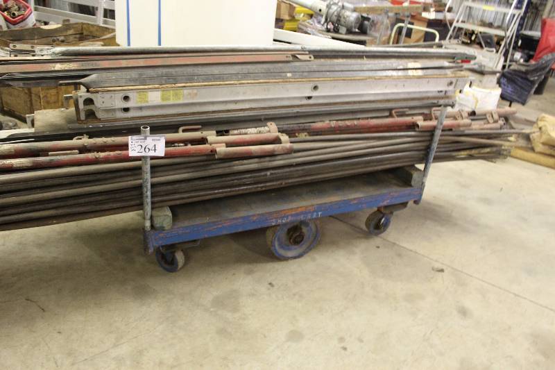 lot 264 image: Cart wCenter Wheels & Corner Bars Does Not Include Contents 30 x 62 x 14.5.