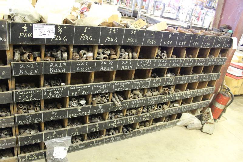 lot 247 image: Storage Shelf Lot Including Storage Shelf, 8.5 x 96 x 48 Metal Bush Fittings Metal Plugs Metal Caps And More.