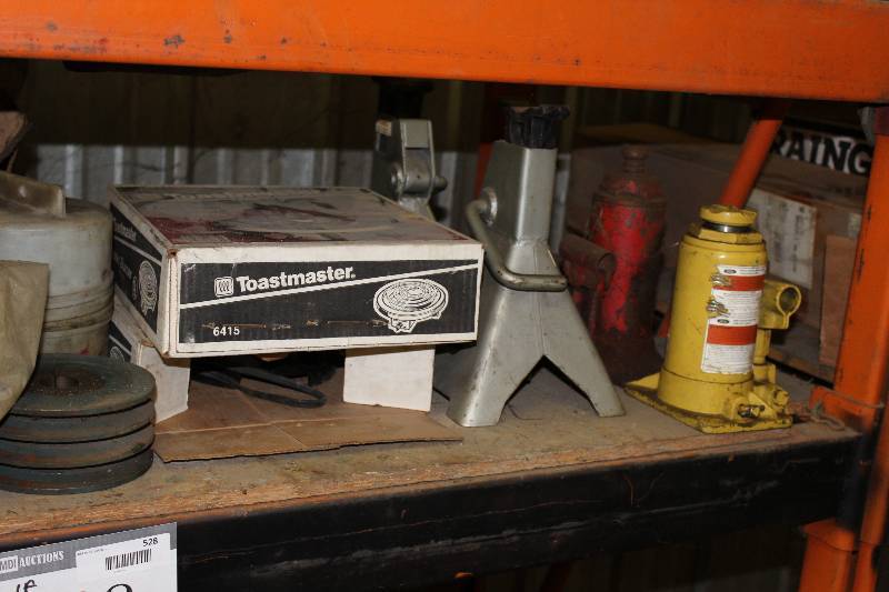 lot 528 image: Shelf Lot Including JAC Parts Toastmaster Pump Jack Jack Stand And More.