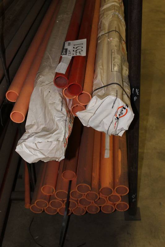 lot 551 image: Lot of (2) Shelves Including 1.5 x 10 CPVC Pipes (12) 2 x 15 CPVC Pipes (21).